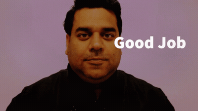 A Man Giving A Thumbs Up With The Words Good Job Behind Him GIF