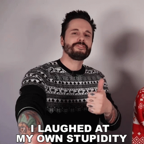 A Man Giving A Thumbs Up With The Words I Laughed At My Own Stupidity Below Him GIF