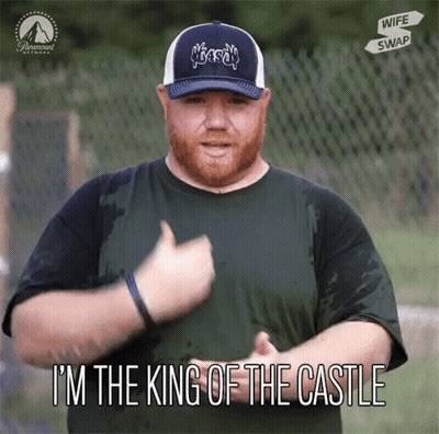A Man Giving A Thumbs Up With The Words I 'M The King Of The Castle GIF