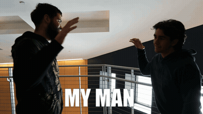 A Man Giving Another Man A High Five With The Words My Man Behind Them GIF