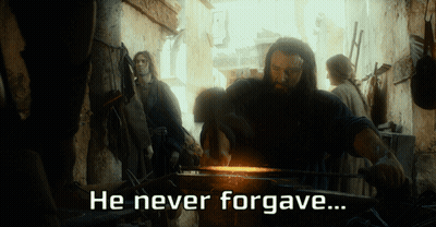 A Man Hammering A Piece Of Metal With The Words He Never Forgave GIF
