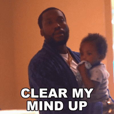 A Man Holding A Baby With The Words Clear My Mind Up GIF