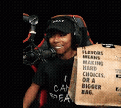 A Man Holding A Bag That Says Flavors Means Making Hard Choices Or A Bigger Bag . GIF