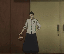 A Man Holding A Basketball In Front Of A Door GIF