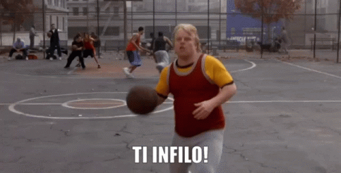 A Man Holding A Basketball On A Basketball Court With The Words Ti Infilo Written On The Bottom GIF