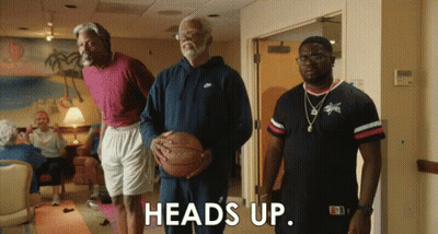 A Man Holding A Basketball Says " Heads Up " GIF