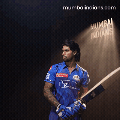 A Man Holding A Bat In Front Of A Sign That Says ' Mumbai Indians ' GIF