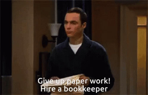 A Man Holding A Bunch Of Papers With The Words Give Up Paper Work Hire A Bookkeeper Below Him GIF