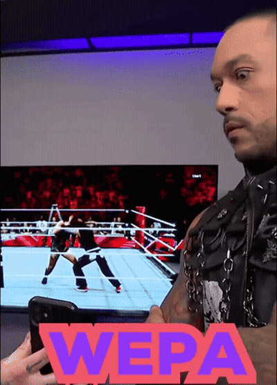 A Man Holding A Cell Phone In Front Of A Television With The Word Wepa On It GIF