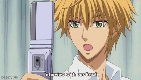 A Man Holding A Cell Phone With The Words Interview With Our Prez Written Below Him GIF