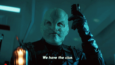A Man Holding A Cell Phone With The Words We Have The Clue Above Him GIF