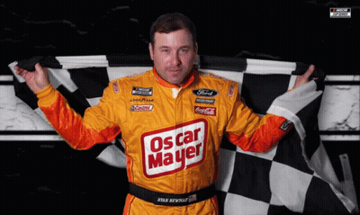 A Man Holding A Checkered Flag That Says Oscar Mayer GIF