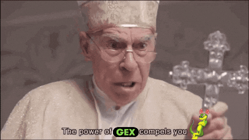 A Man Holding A Cross With The Words " The Power Of Gex Compels You " Above Him GIF