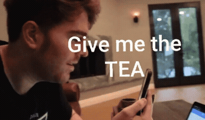 A Man Holding A Cup Of Tea With The Words Give Me The Tea Written Above Him GIF