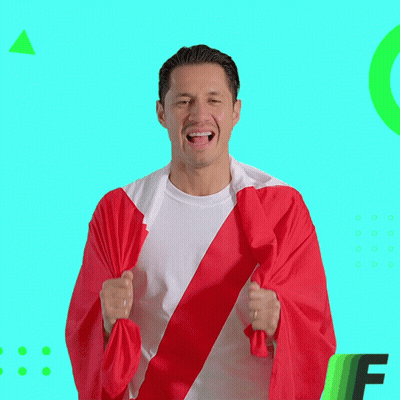 A Man Holding A Flag With The Words " Arriba Peru " Written On It GIF