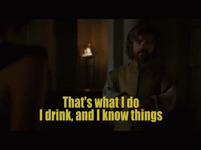 A Man Holding A Glass Of Wine With The Words That 'S What I Do I Drink And I Know Things GIF