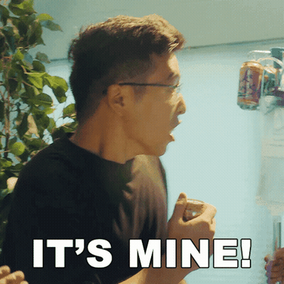 A Man Holding A Glass With The Words It 'S Mine Written Below Him GIF