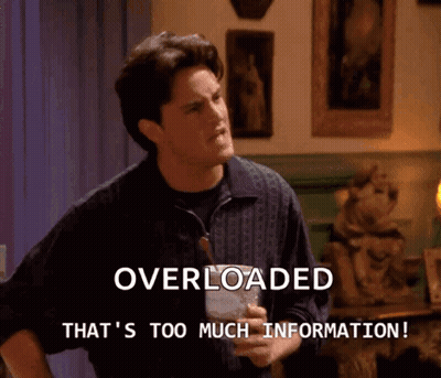 A Man Holding A Glass With The Words Overloaded That 'S Too Much Information GIF