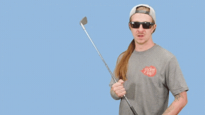 A Man Holding A Golf Club With The Words I 'M Here To Kick Ass And Chew Bubble Gum Below Him GIF