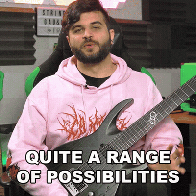 A Man Holding A Guitar With The Words Quite A Range Of Possibilities Written Below Him GIF