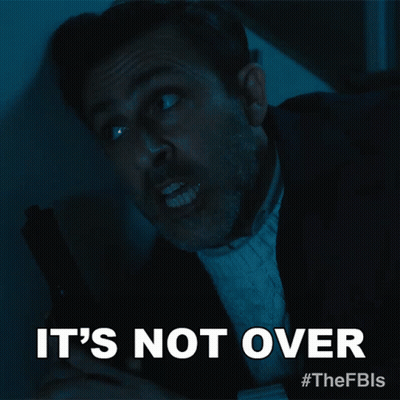 A Man Holding A Gun With The Words It 'S Not Over Above Him GIF