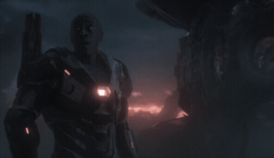 A Man Holding A Gun With The Words It 'S Really Helpful Below Him GIF