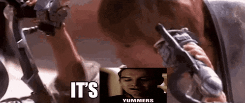 A Man Holding A Gun With The Words It 'S Yummers Written On The Bottom GIF