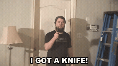 A Man Holding A Knife With The Words I Got A Knife Behind Him GIF