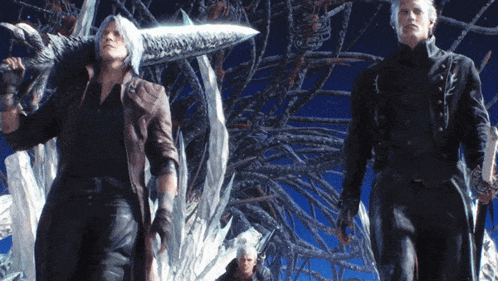 A Man Holding A Large Sword Stands Between Two Other Men GIF