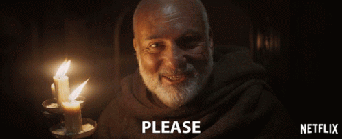 A Man Holding A Lit Candle With The Words Stay As Long As You Wish Written Below Him GIF