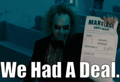 A Man Holding A Marriage Agreement With The Words We Had A Deal GIF