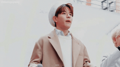 A Man Holding A Microphone Next To Another Man With The Word Daesongyang On The Bottom Left GIF