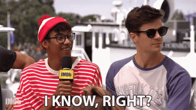 A Man Holding A Microphone Says " I Know Right " Next To Another Man GIF