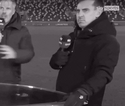 A Man Holding A Microphone With The Word Sky Sports On It GIF