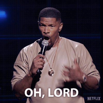 A Man Holding A Microphone With The Words Oh Lord Above Him GIF