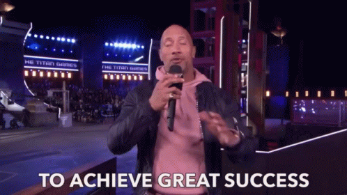 A Man Holding A Microphone With The Words To Achieve Great Success Below Him GIF