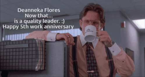 A Man Holding A Mug That Says Python On It GIF