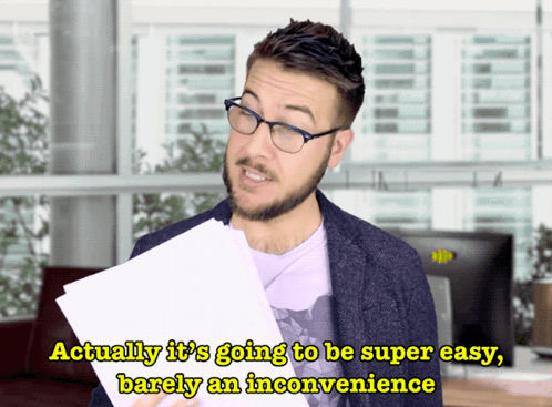 A Man Holding A Piece Of Paper That Says Actually It 'S Going To Be Super Easy GIF