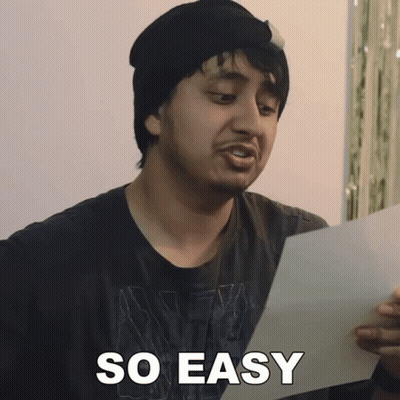 A Man Holding A Piece Of Paper With The Words So Easy Written On It GIF