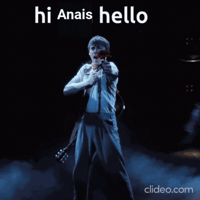 A Man Holding A Red Rose With The Words Hi Anais Hello Written Above Him GIF