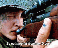 A Man Holding A Rifle With The Words Be Not Thou Far From Me O Lord GIF