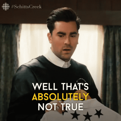 A Man Holding A Shirt That Says Well That 'S Absolutely Not True On It GIF