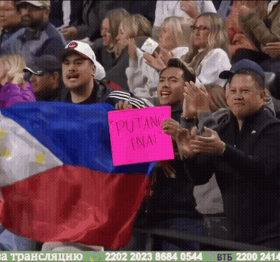 A Man Holding A Sign That Says " Putang Ina " GIF
