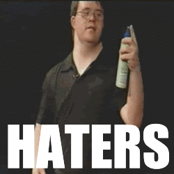 A Man Holding A Spray Bottle In Front Of A Sign That Says " Haters " GIF