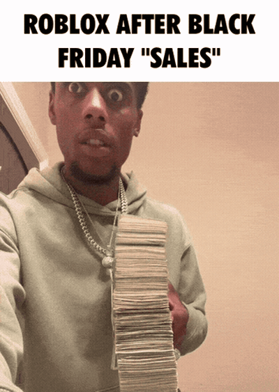 A Man Holding A Stack Of Money With The Words Roblox After Black Friday Sales GIF