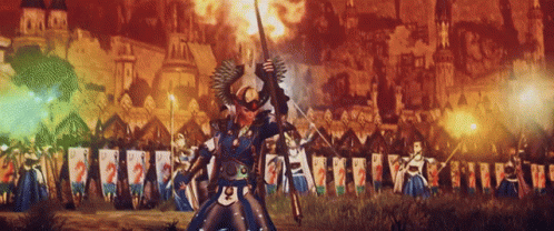 A Man Holding A Sword Stands In Front Of A Castle GIF
