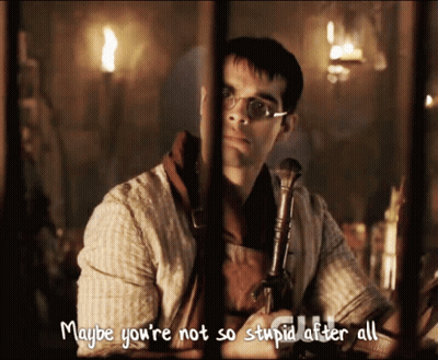 A Man Holding A Sword With The Words Maybe You 'Re Not So Stupid After All GIF