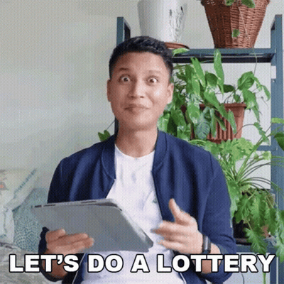 A Man Holding A Tablet With The Words Let 'S Do A Lottery Below Him GIF