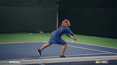 A Man Holding A Tennis Racquet On A Tennis Court With The Nbc Logo GIF