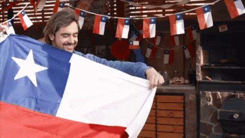 A Man Holding A Texas Flag With A White Star On It GIF